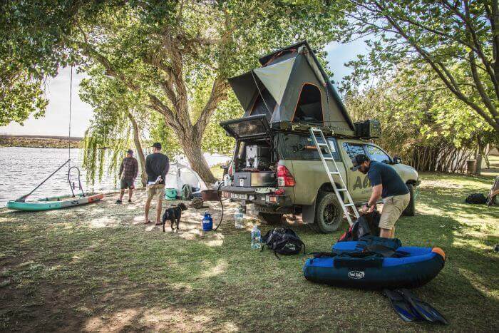 Alu-Cab Rooftop Tent on top of a pickup truck