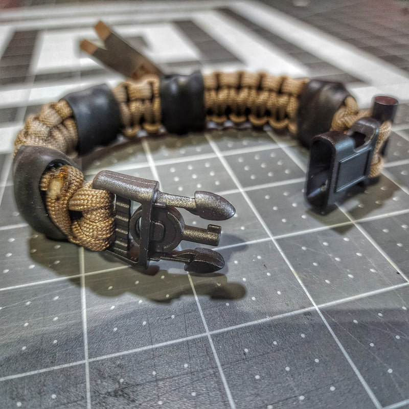 Load image into Gallery viewer, Urban Carry Strap - EDC Bracelet with Pry Bar, Firestarter, Kevlar Saw and Cuff Key or LED Flashlight.