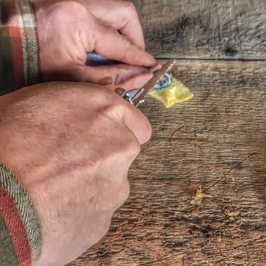 Saw Shemagh: Firestarter sewn button, built-in Kevlar Utility Saw, Fire Tinder border.