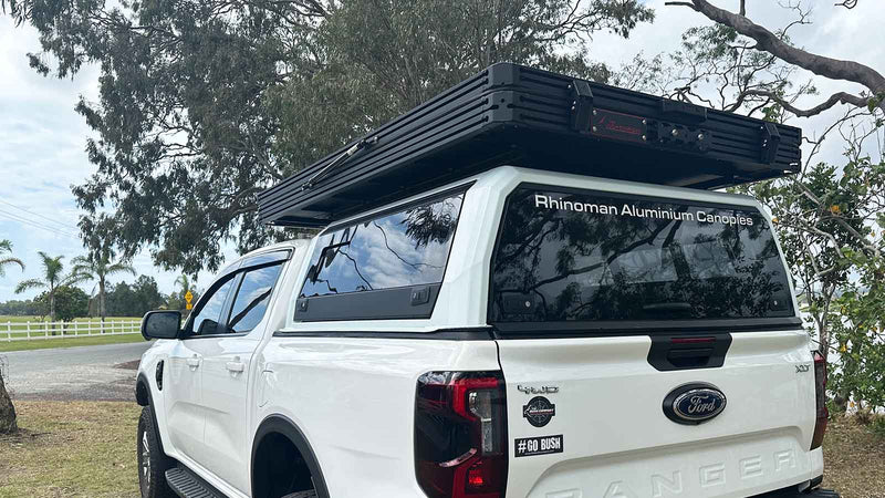 Load image into Gallery viewer, The Bush Company LX27 Clamshell Rooftop Tent
