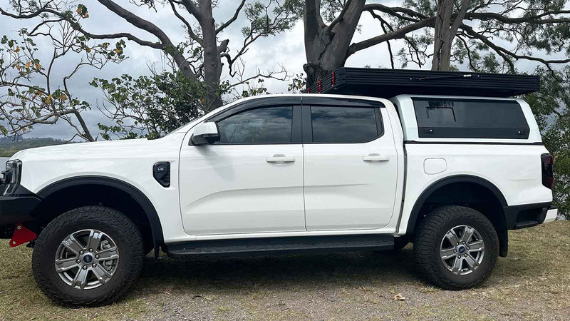 Load image into Gallery viewer, The Bush Company LX27 Clamshell Rooftop Tent
