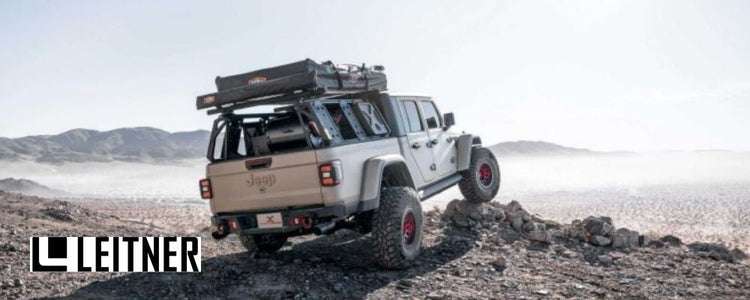 Jeep overlanding on rugged terrain with a Leitner Design mount