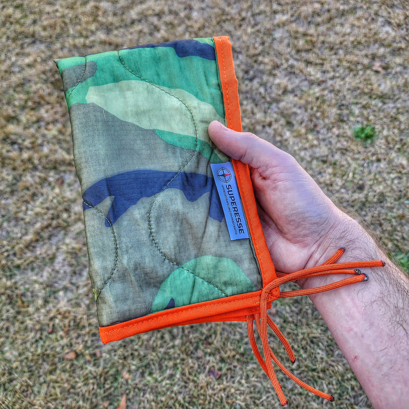 Load image into Gallery viewer, Woobie Hank: Insulated with USGI poncho-liner, serves as a large rag, knee pad, and adventure companion tool.

