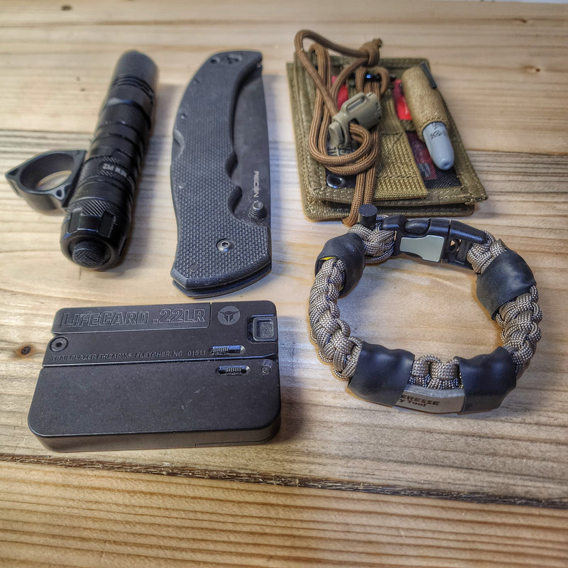 Load image into Gallery viewer, Urban Carry Strap - EDC Bracelet with Pry Bar, Firestarter, Kevlar Saw and Cuff Key or LED Flashlight.
