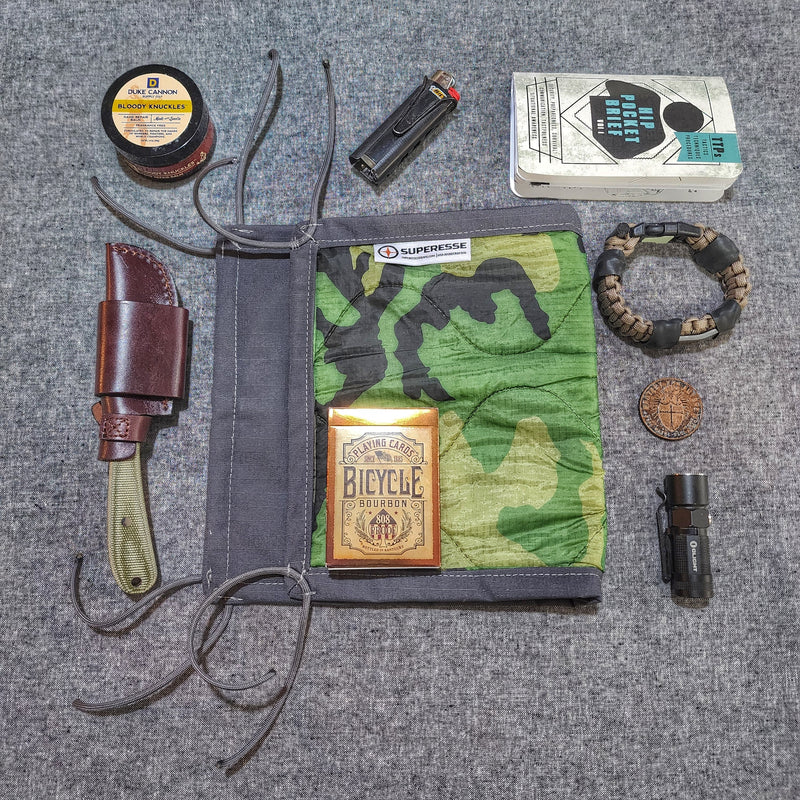 Load image into Gallery viewer, Woobie Hank: Insulated with USGI poncho-liner, serves as a large rag, knee pad, and adventure companion tool.
