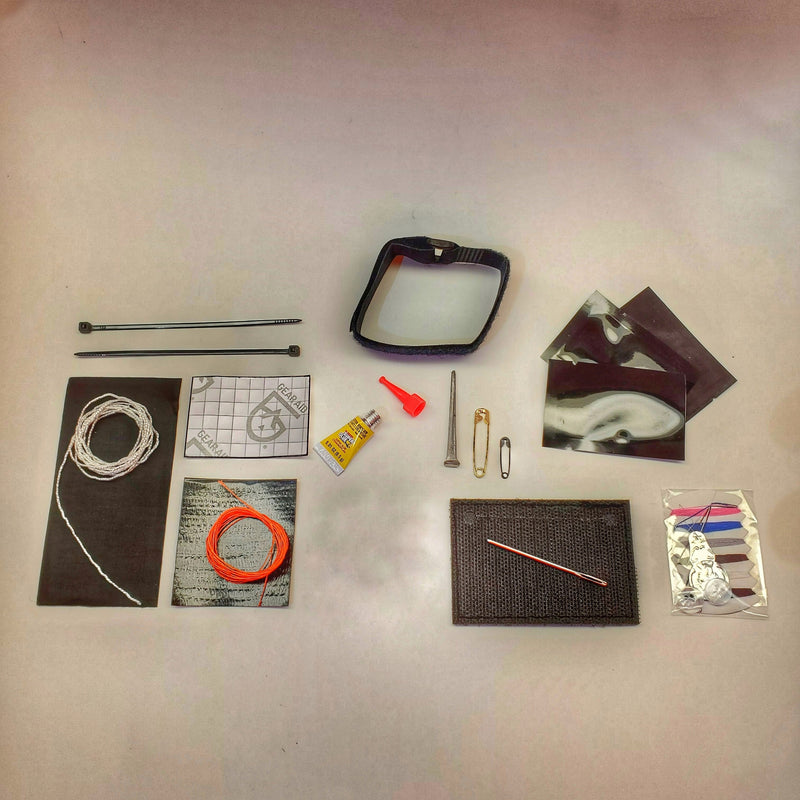 Load image into Gallery viewer, Field Repair Patch Kit - Fix broken items, stitch torn bags, parch tent rips, and seal holes.
