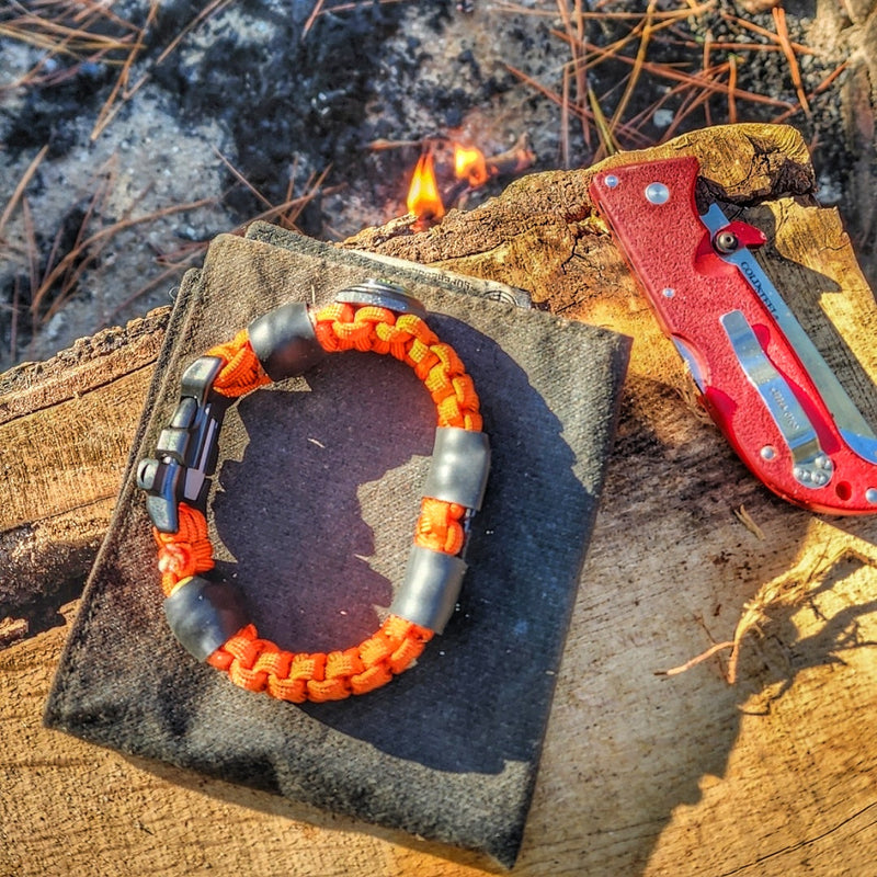 Load image into Gallery viewer, Camper Strap - Outdoor, Hike, &amp; Kayak ready Survival Fire Starter Paracord Bracelet.
