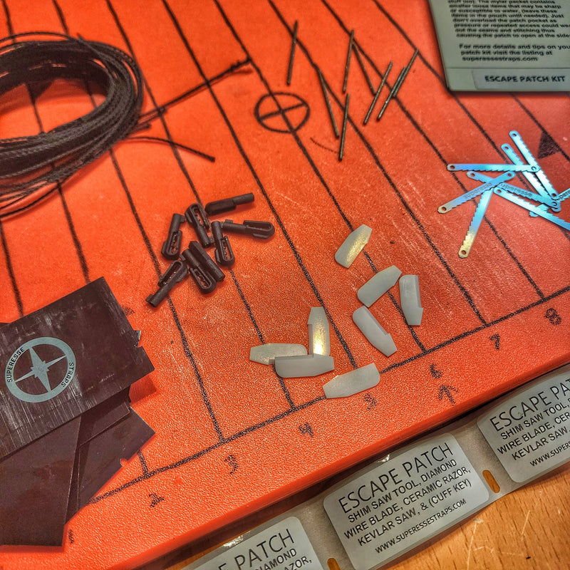 Load image into Gallery viewer, Escape Patch Kit - micro restraint defeat implements and detention evasion gear
