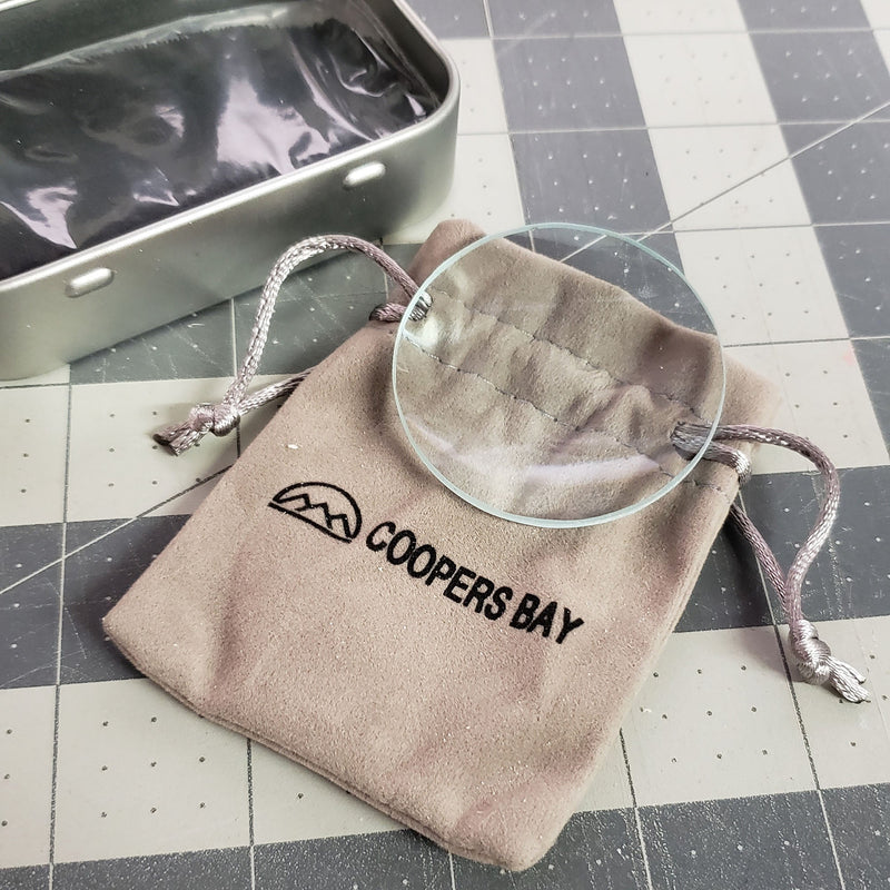 Load image into Gallery viewer, Lens Burning Fire Starter Kit - Includes Glass Magnifying Lens, Char Cloth &amp; Tin
