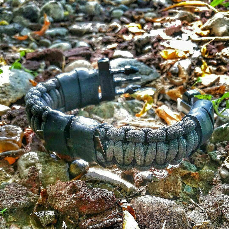 Load image into Gallery viewer, Camper Strap - Outdoor, Hike, &amp; Kayak ready Survival Fire Starter Paracord Bracelet.
