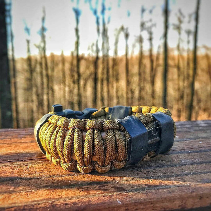 Load image into Gallery viewer, Camper Strap - Outdoor, Hike, &amp; Kayak ready Survival Fire Starter Paracord Bracelet.
