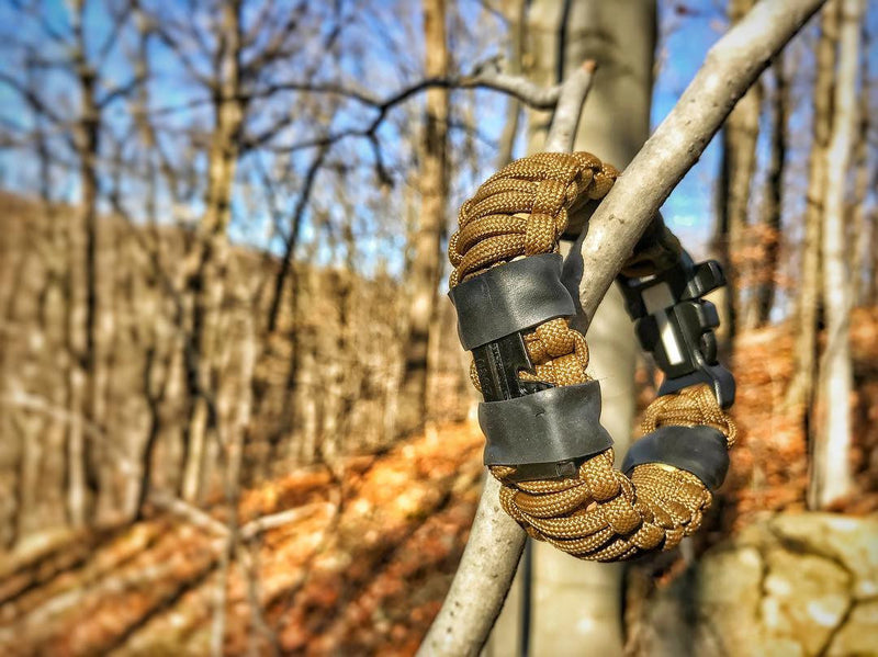 Load image into Gallery viewer, Camper Strap - Outdoor, Hike, &amp; Kayak ready Survival Fire Starter Paracord Bracelet.
