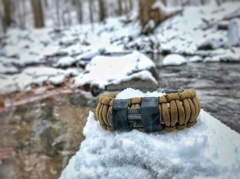 Load image into Gallery viewer, Camper Strap - Outdoor, Hike, &amp; Kayak ready Survival Fire Starter Paracord Bracelet.
