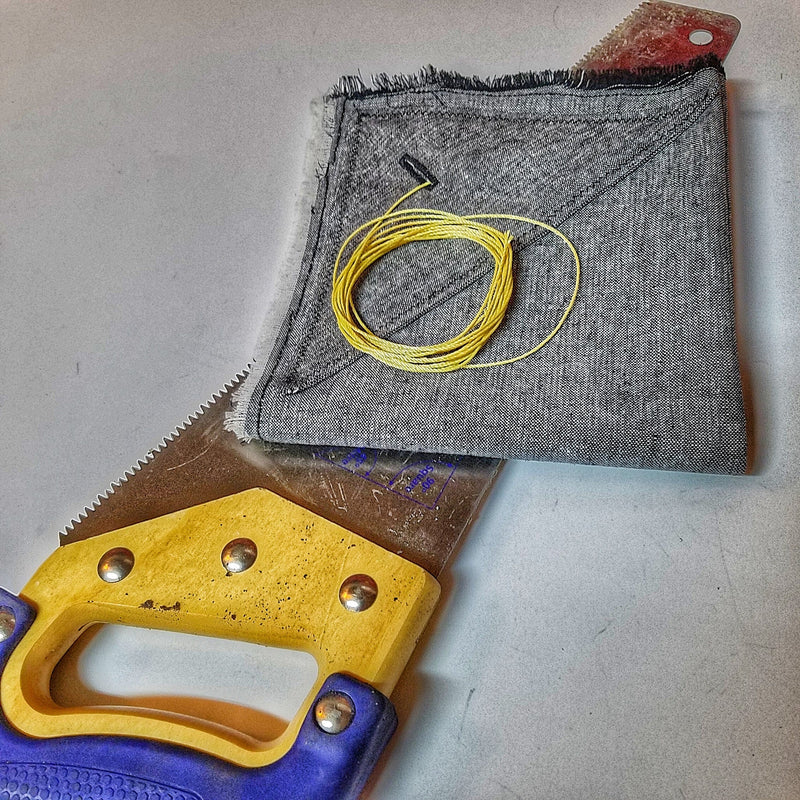 Load image into Gallery viewer, Saw Shemagh: Firestarter sewn button, built-in Kevlar Utility Saw, Fire Tinder border.

