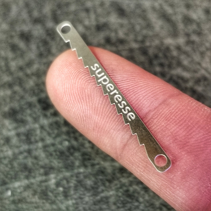 Load image into Gallery viewer, Saw Shim Tool - Custom built flexible steel escape shim with saw tooth edge (2 pack).
