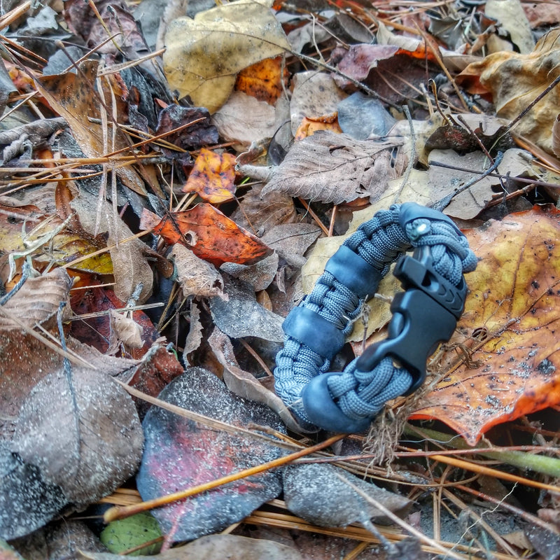 Load image into Gallery viewer, Camper Strap - Outdoor, Hike, &amp; Kayak ready Survival Fire Starter Paracord Bracelet.
