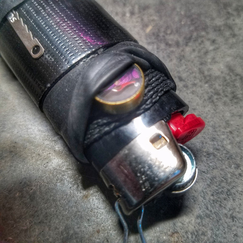 Load image into Gallery viewer, Survival Kit Lighter - Fire Starter outfitted with supplies.
