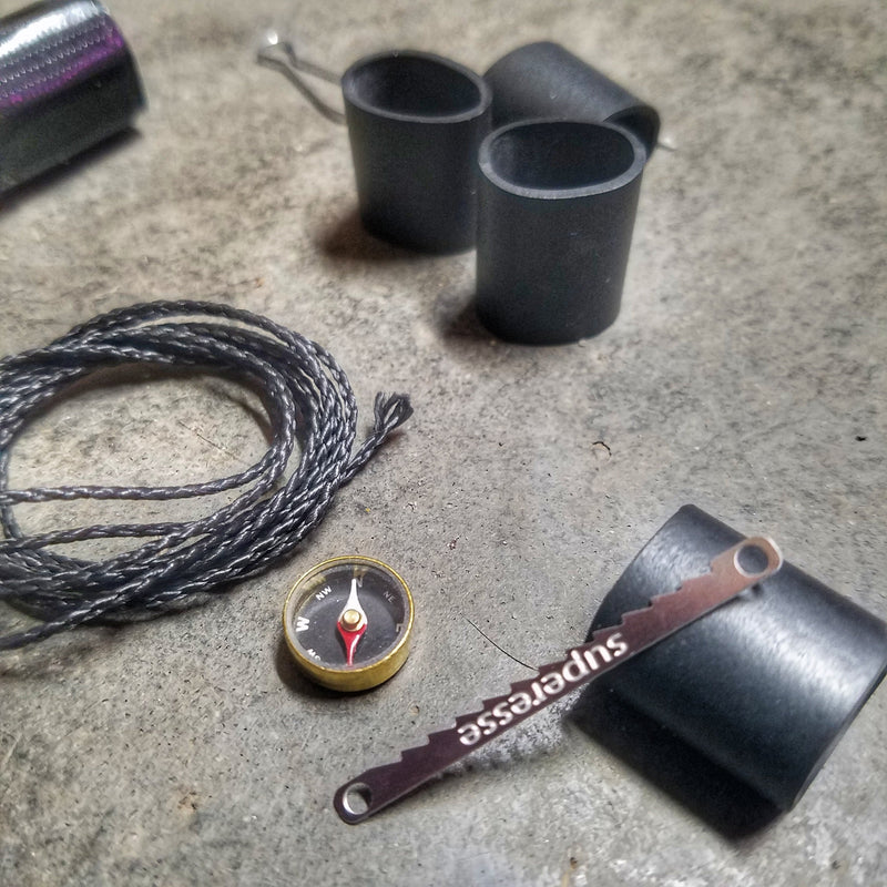 Load image into Gallery viewer, Survival Kit Lighter - Fire Starter outfitted with supplies.
