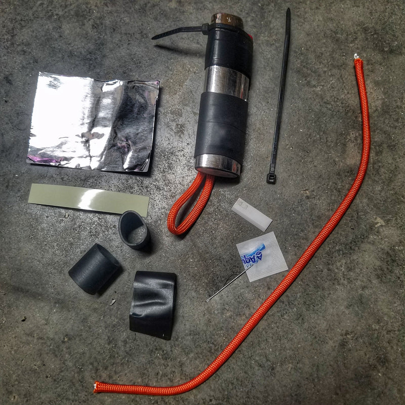 Load image into Gallery viewer, Survival Kit Lighter - Fire Starter outfitted with supplies.

