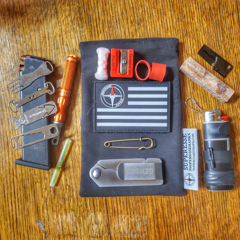 Load image into Gallery viewer, Survival Kit Lighter - Fire Starter outfitted with supplies.
