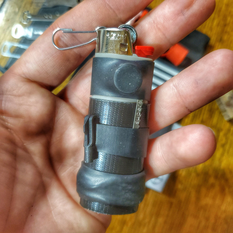 Load image into Gallery viewer, Survival Kit Lighter - Fire Starter outfitted with supplies.
