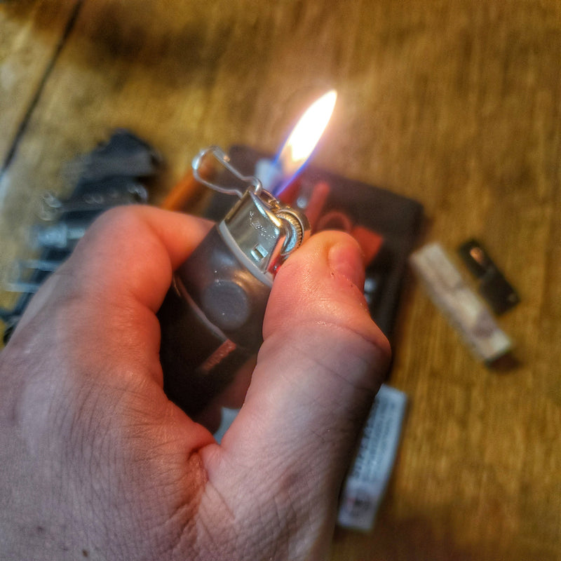 Load image into Gallery viewer, Survival Kit Lighter - Fire Starter outfitted with supplies.
