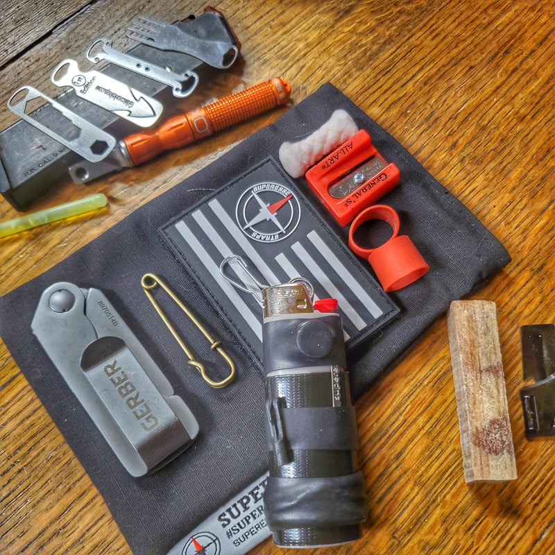 Load image into Gallery viewer, Survival Kit Lighter - Fire Starter outfitted with supplies.
