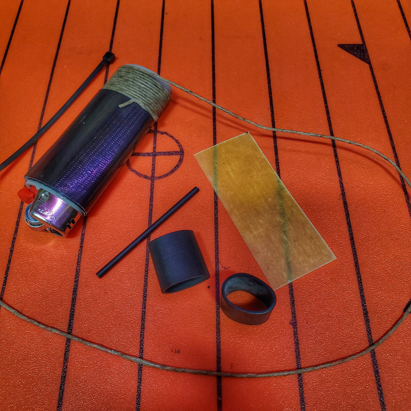 Load image into Gallery viewer, Survival Kit Lighter - Fire Starter outfitted with supplies.
