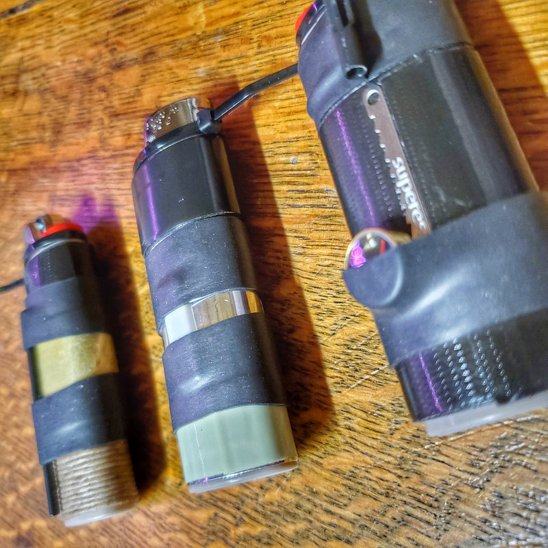 Load image into Gallery viewer, Survival Kit Lighter - Fire Starter outfitted with supplies.
