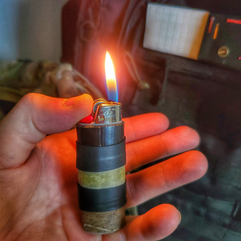Load image into Gallery viewer, Survival Kit Lighter - Fire Starter outfitted with supplies.
