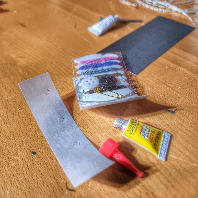 Load image into Gallery viewer, Field Repair Patch Kit - Fix broken items, stitch torn bags, parch tent rips, and seal holes.
