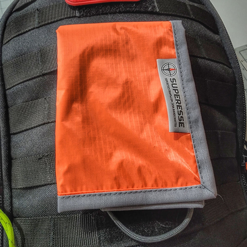 Load image into Gallery viewer, Marker Mat - Fluorescent Signaling Panel on Ripstop Pocket Hank
