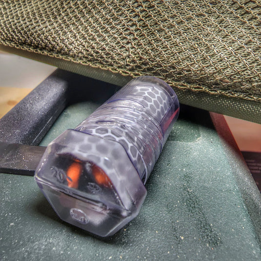 Drop Shell - Polymer Capsule filled with Survival, Escape, and First-Aid Supplies.