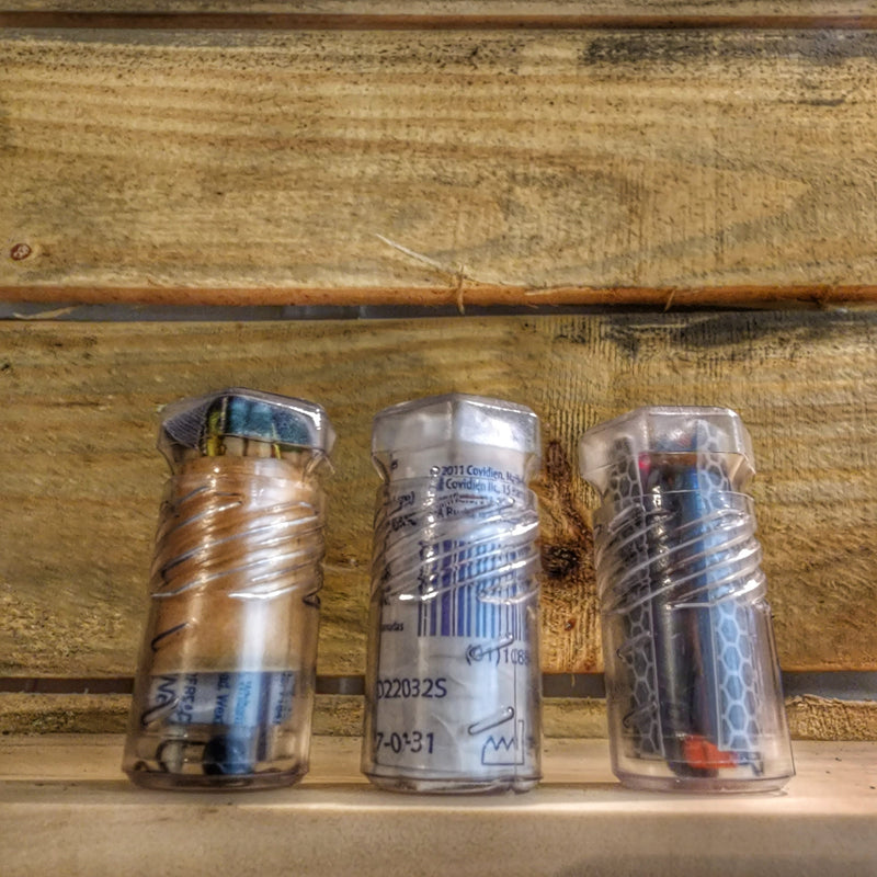 Load image into Gallery viewer, Drop Shell - Polymer Capsule filled with Survival, Escape, and First-Aid Supplies.
