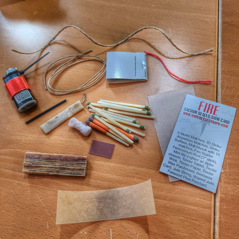 Load image into Gallery viewer, Survival Kit Lighter - Fire Starter outfitted with supplies.
