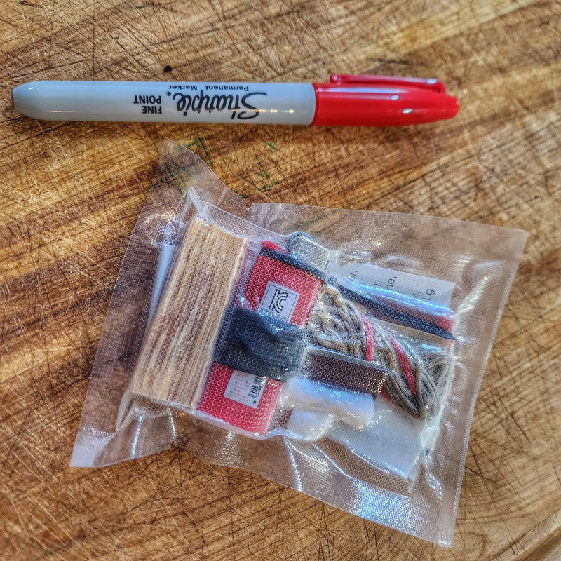 Load image into Gallery viewer, Survival Kit Lighter - Fire Starter outfitted with supplies.
