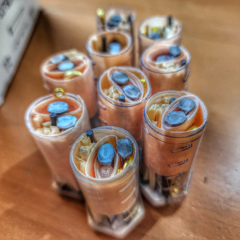Load image into Gallery viewer, Drop Shell - Polymer Capsule filled with Survival, Escape, and First-Aid Supplies.
