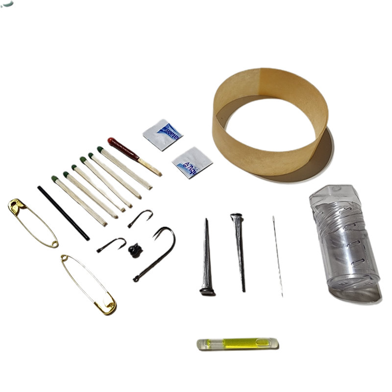 Load image into Gallery viewer, Drop Shell - Polymer Capsule filled with Survival, Escape, and First-Aid Supplies.
