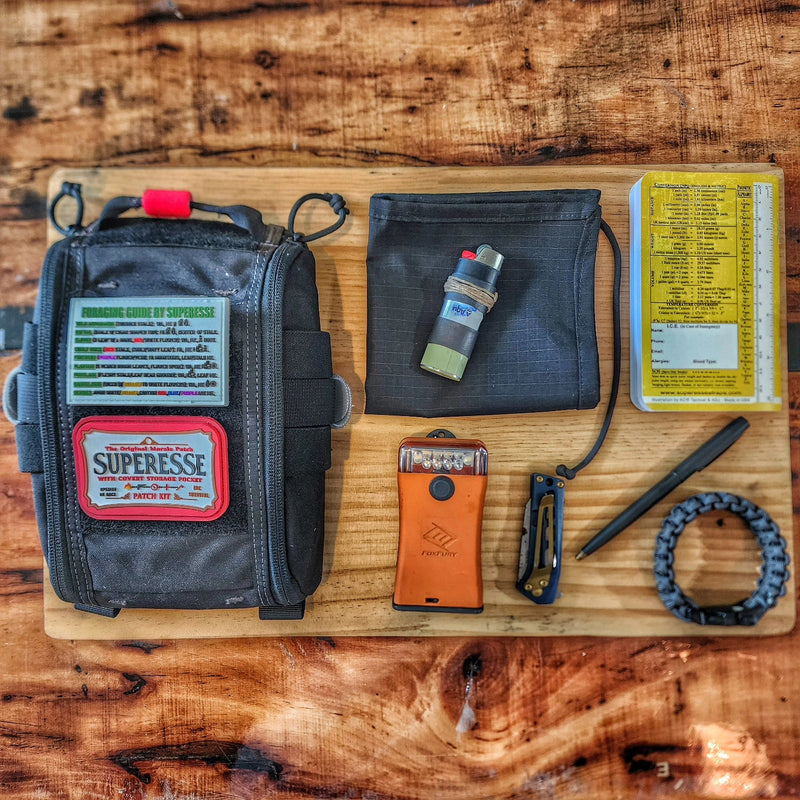 Load image into Gallery viewer, Pull Cloth - Lightweight minimalist handkerchief with paracord lanyard.

