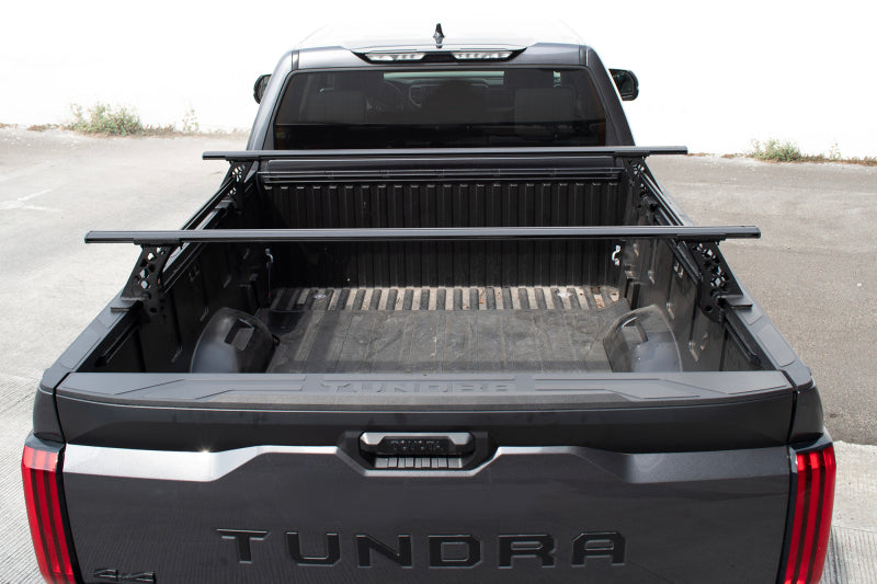 Load image into Gallery viewer, Go Rhino 15-22 Ford F-150 / 19-22 RAM 1500 / 07-21 Toyota Tundra XRS Cross Bars Kit - Tex. Blk
