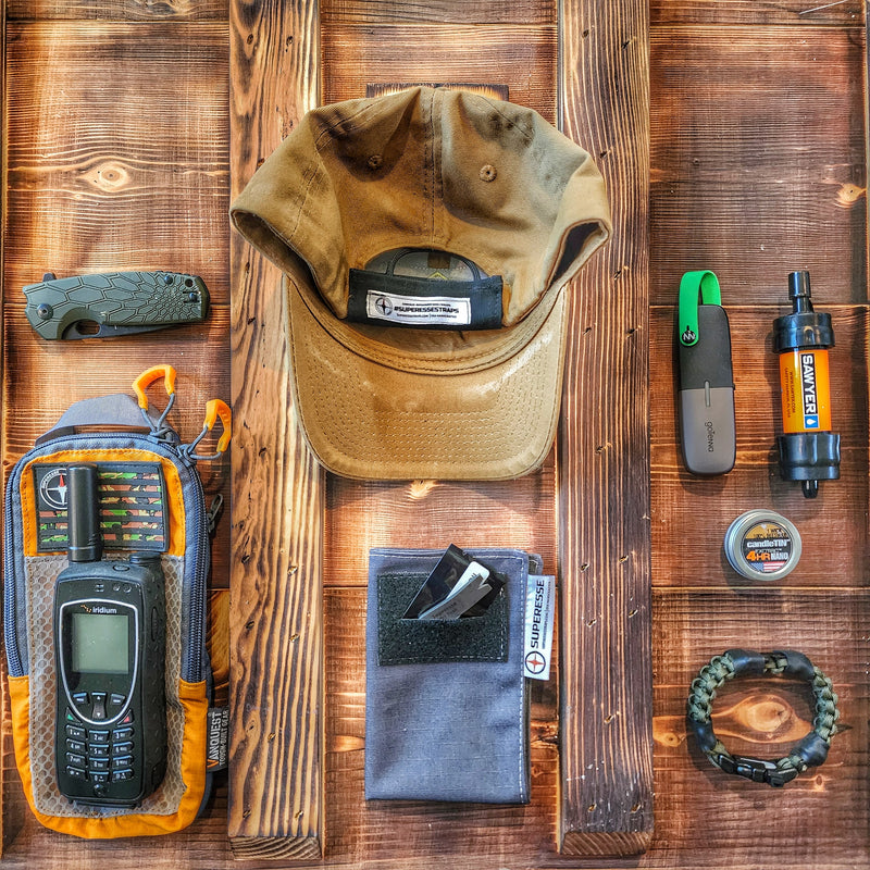 Load image into Gallery viewer, Camper Strap - Outdoor, Hike, &amp; Kayak ready Survival Fire Starter Paracord Bracelet.
